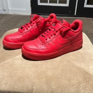 Women’s red nike custom Air Force ones in very good condition.